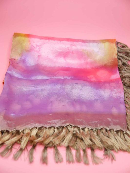 Tie dyed square fringed scarf shawl in colours of pinks, purples, gold with gold fringing and silky sheen to the fabric.