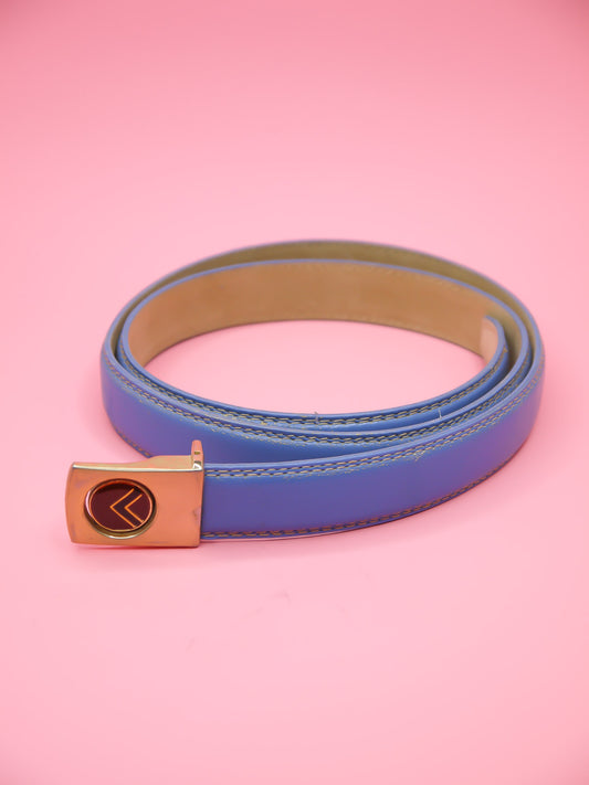 Thin blue leather belt with a push pin brass buckle featuring a chevron emblem