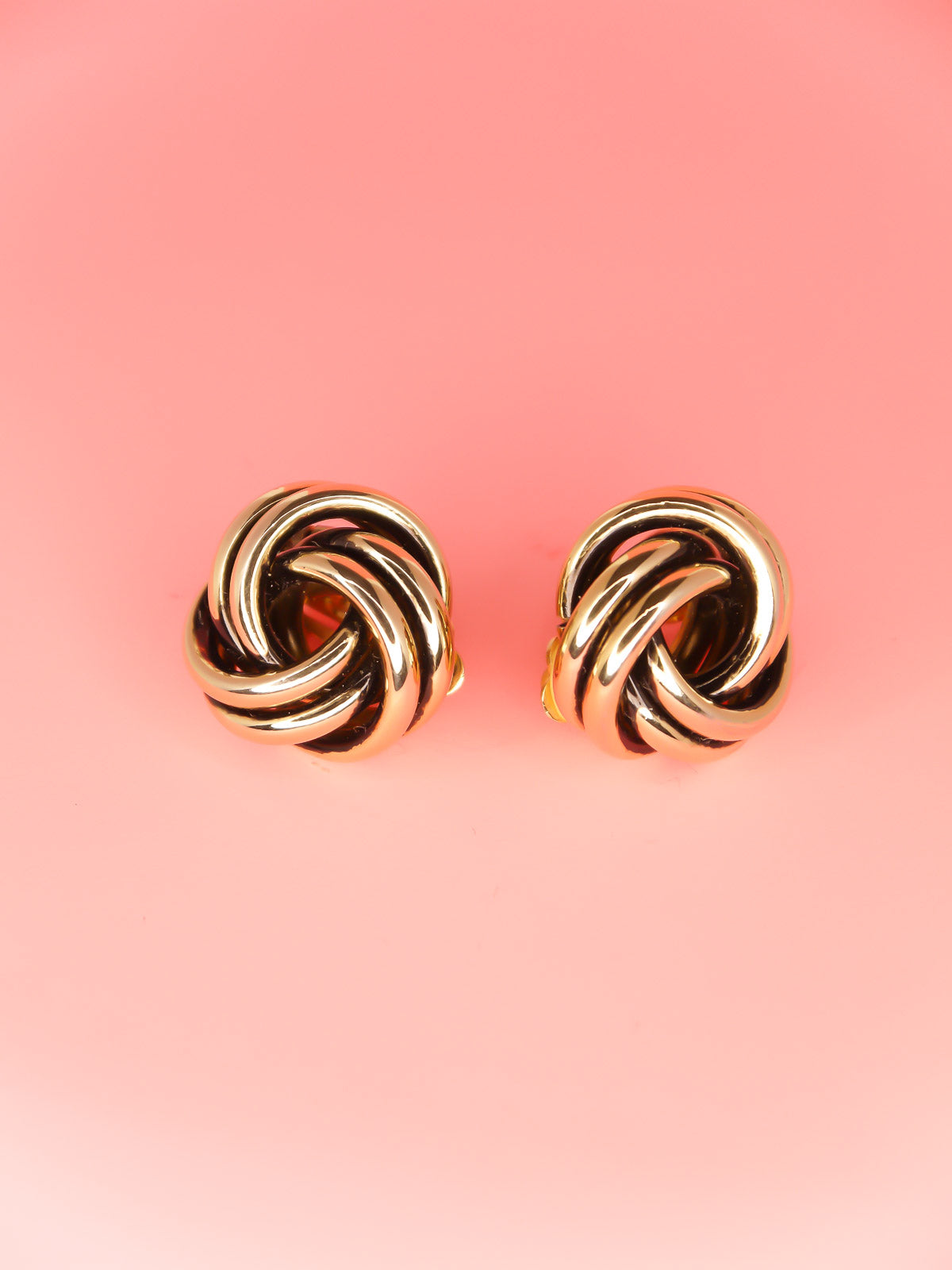 Vintage 80's gold tone and black knot swirl clip on earrings