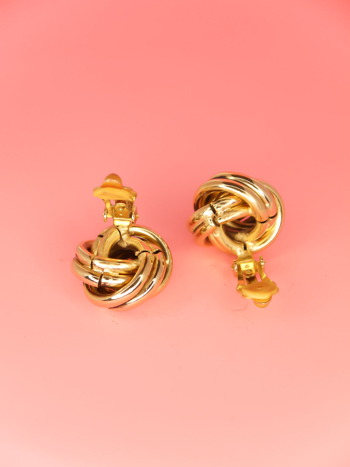 Vintage 80's gold tone and black knot swirl clip on earrings