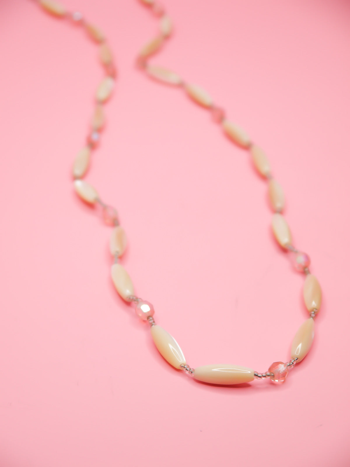 Vintage Mother of Pearl beaded long necklace with tube faceted pearl beads and pink crystal faceted beads with clear seed beads and a metal clasp