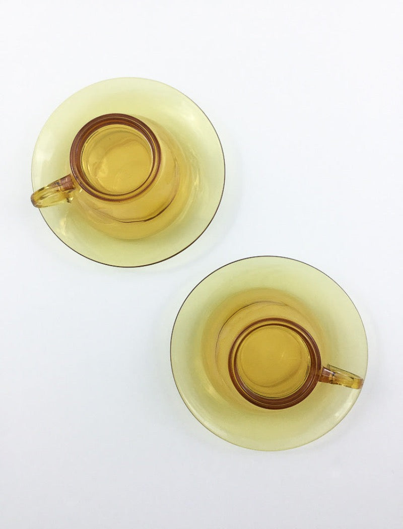 Vintage amber glass cup and saucer set for tea or coffee