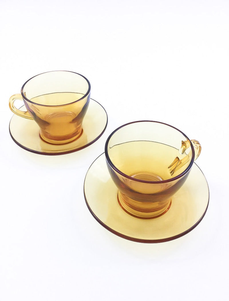 Vintage amber glass cup and saucer set for tea or coffee