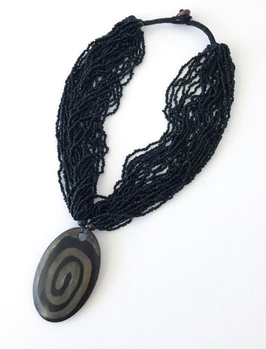 Black multi strand seed bead pendant statement necklace