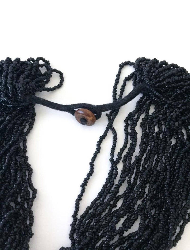 Black multi strand seed bead pendant statement necklace