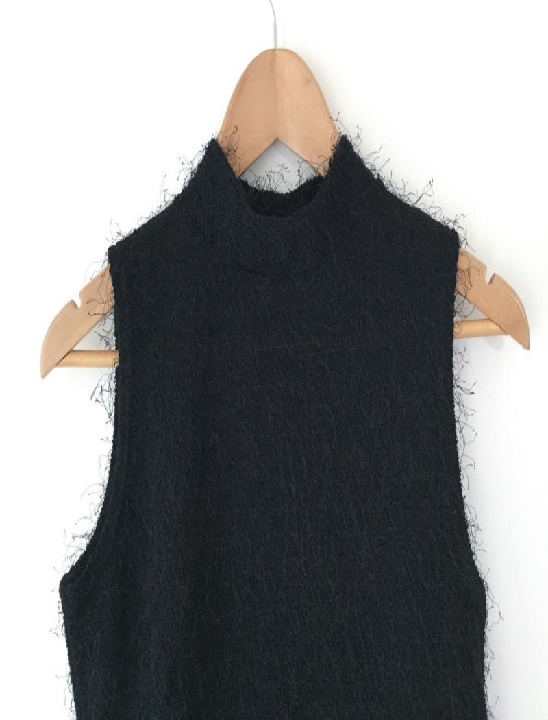 Black mock neck sleeveless top