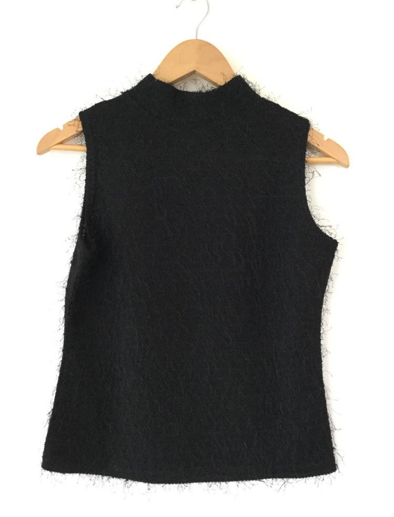 Black mock neck sleeveless top