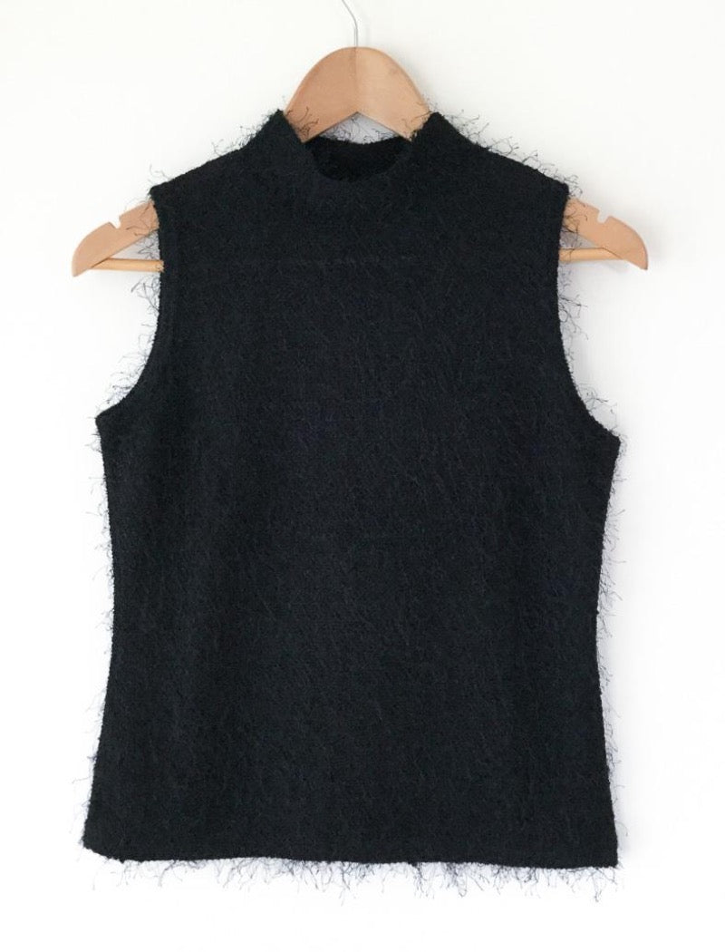 Black mock neck sleeveless top