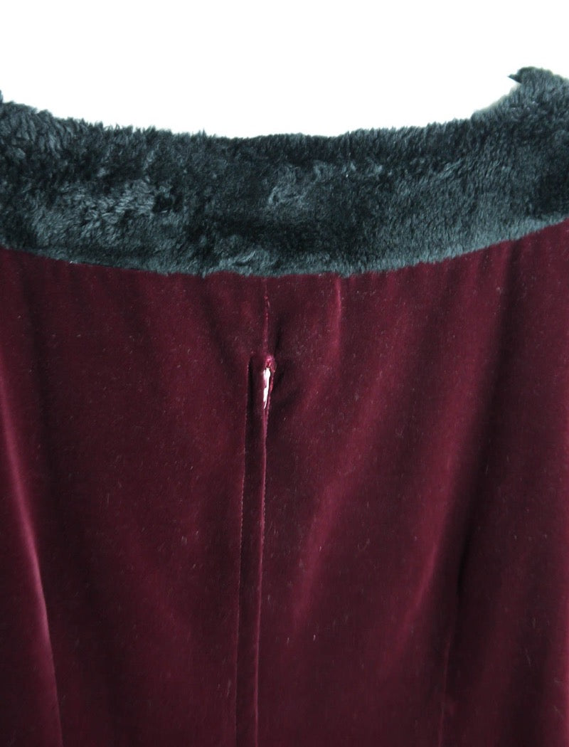 Burgundy body-con velvet mini dress with black fake fur trim