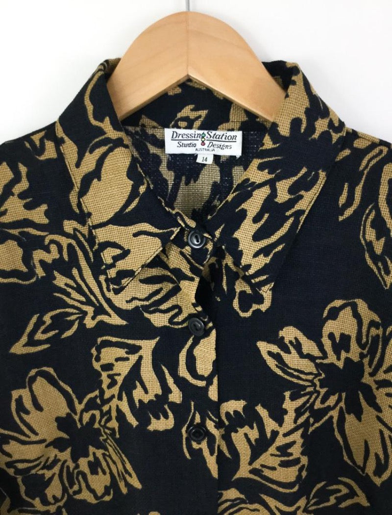 Floral print three quarter length sleeve shirt