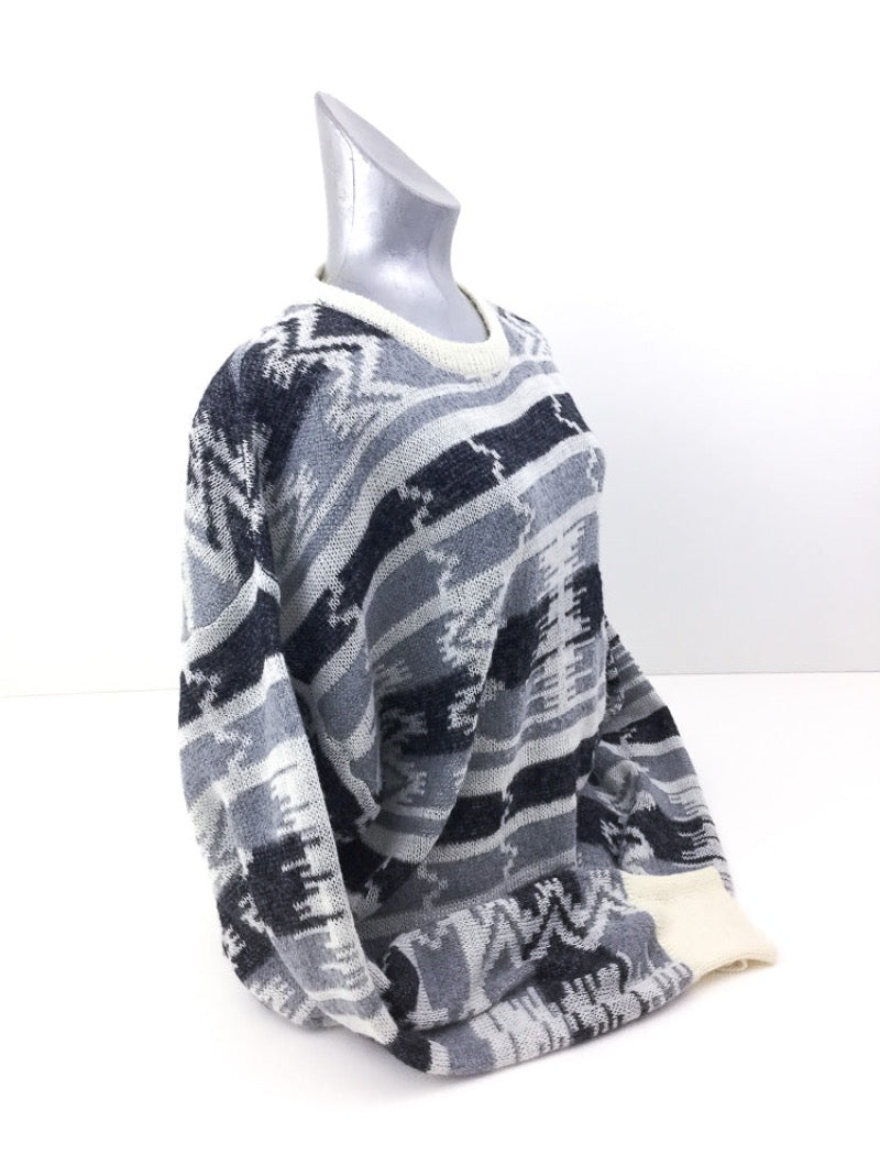 Grey and black aztec print unisex fine knit jumper with cream ribbed neckline, cuffs and hem