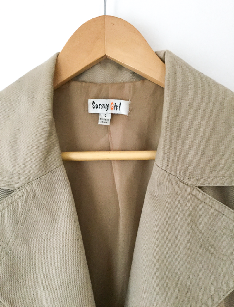 Neutral trench coat with sash