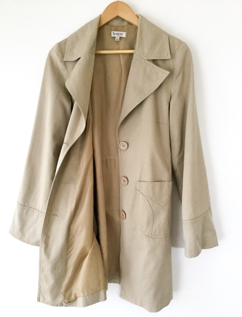 Neutral trench coat with sash