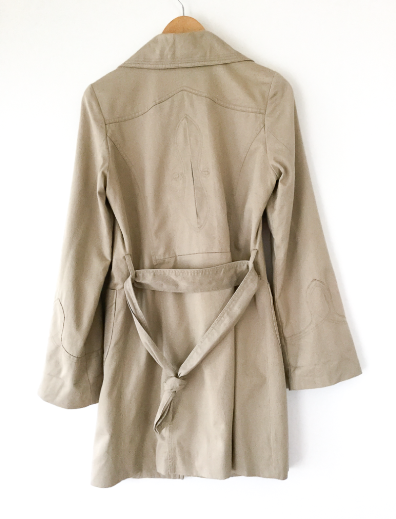 Neutral trench coat with sash