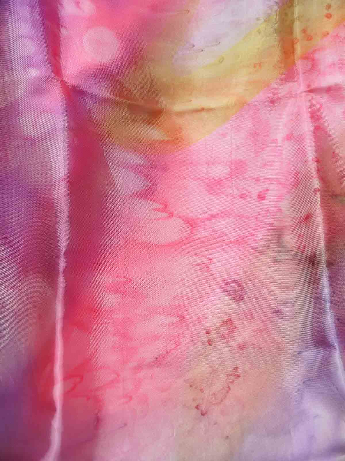 Tie dyed square fringed scarf shawl in colours of pinks, purples, gold with gold fringing and silky sheen to the fabric.